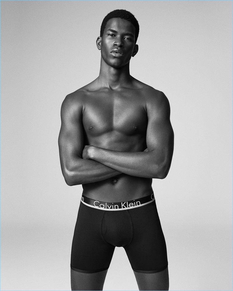 Crossing his arms, Salomon Diaz sports Calvin Klein's Comfort Microfiber boxer brief. 