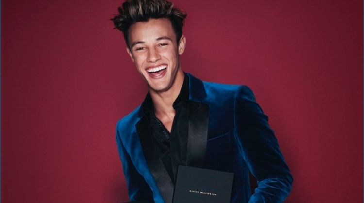 All smiles, Cameron Dallas stars in Daniel Wellington's holiday 2017 campaign.