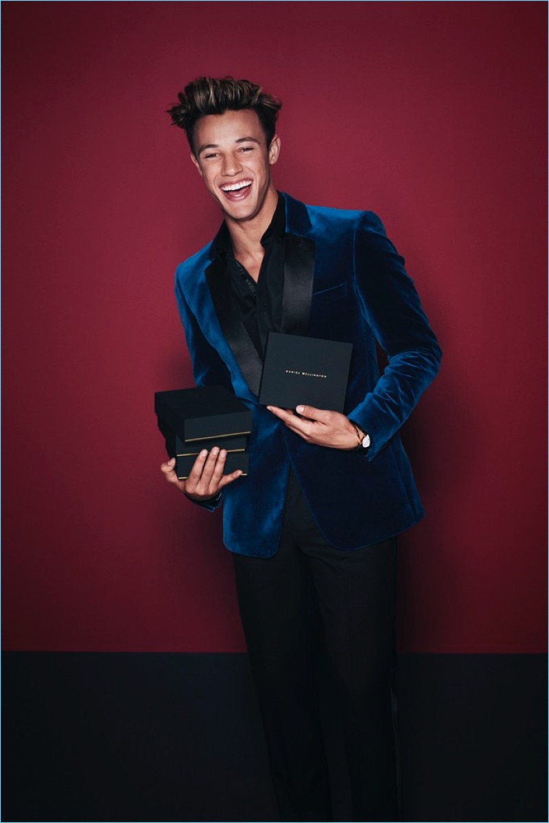 All smiles, Cameron Dallas stars in Daniel Wellington's holiday 2017 campaign.