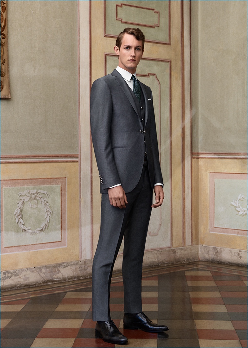 A striking vision, Rutger Schoone dons a grey suit by Canali.