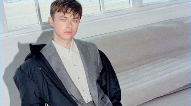 Connecting with GQ Style Germany, Dane DeHaan wears a Gosha Rubchinskiy x Adidas parka. He also sports a BOSS suit with an Our Legacy shirt. Balenciaga sneakers round out DeHaan's look.