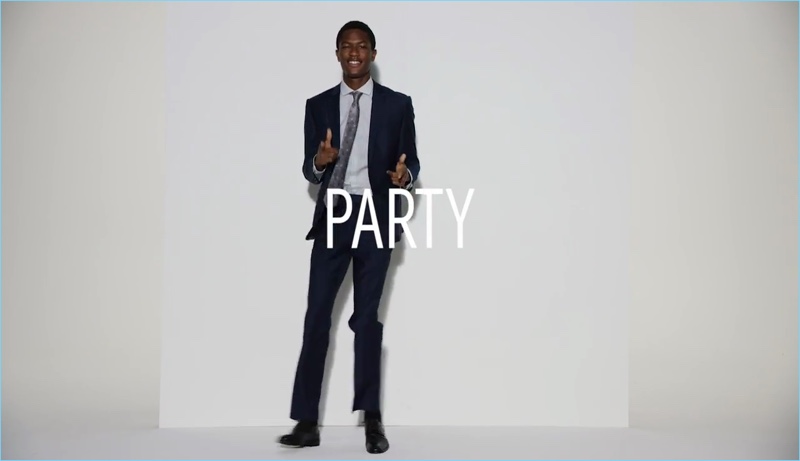 Hamid Onifade suits up for Express' holiday 2017 commercial.