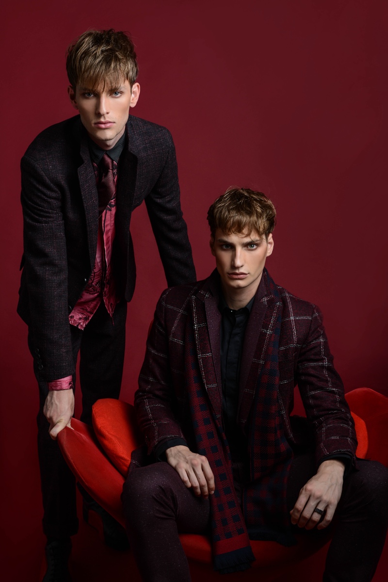 Left to Right: Thomas Barry wears silk shirt Christian Pellizzari, tie and suit Canali. Felix Velbinger wears suit Daks, check scarf Canali, and shirt Les Hommes.