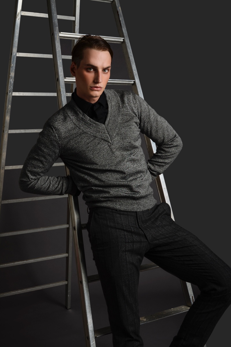 Felix Velbinger wears shirt Les Hommes, v-neck sweater Dirk Bikkembergs, and pants Daks.