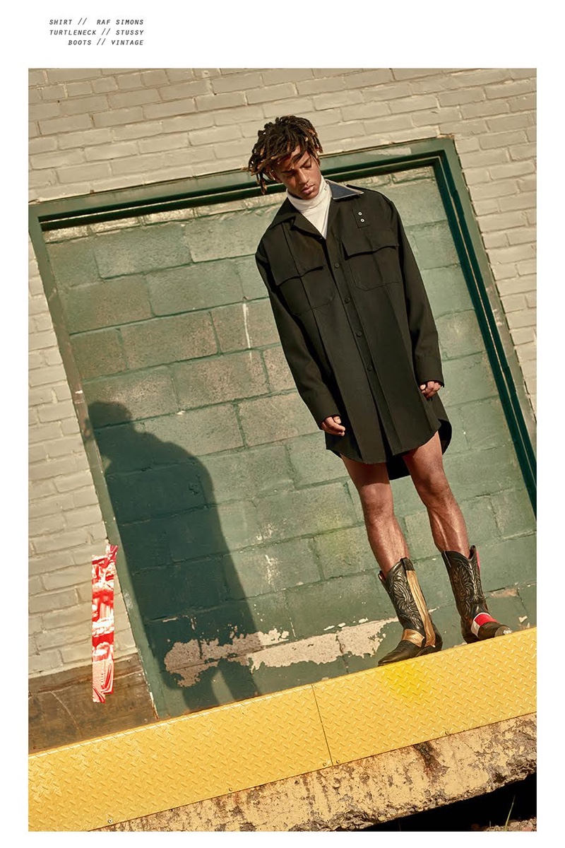 Austin wears shirt Raf Simons, turtleneck Stüssy, and vintage boots.