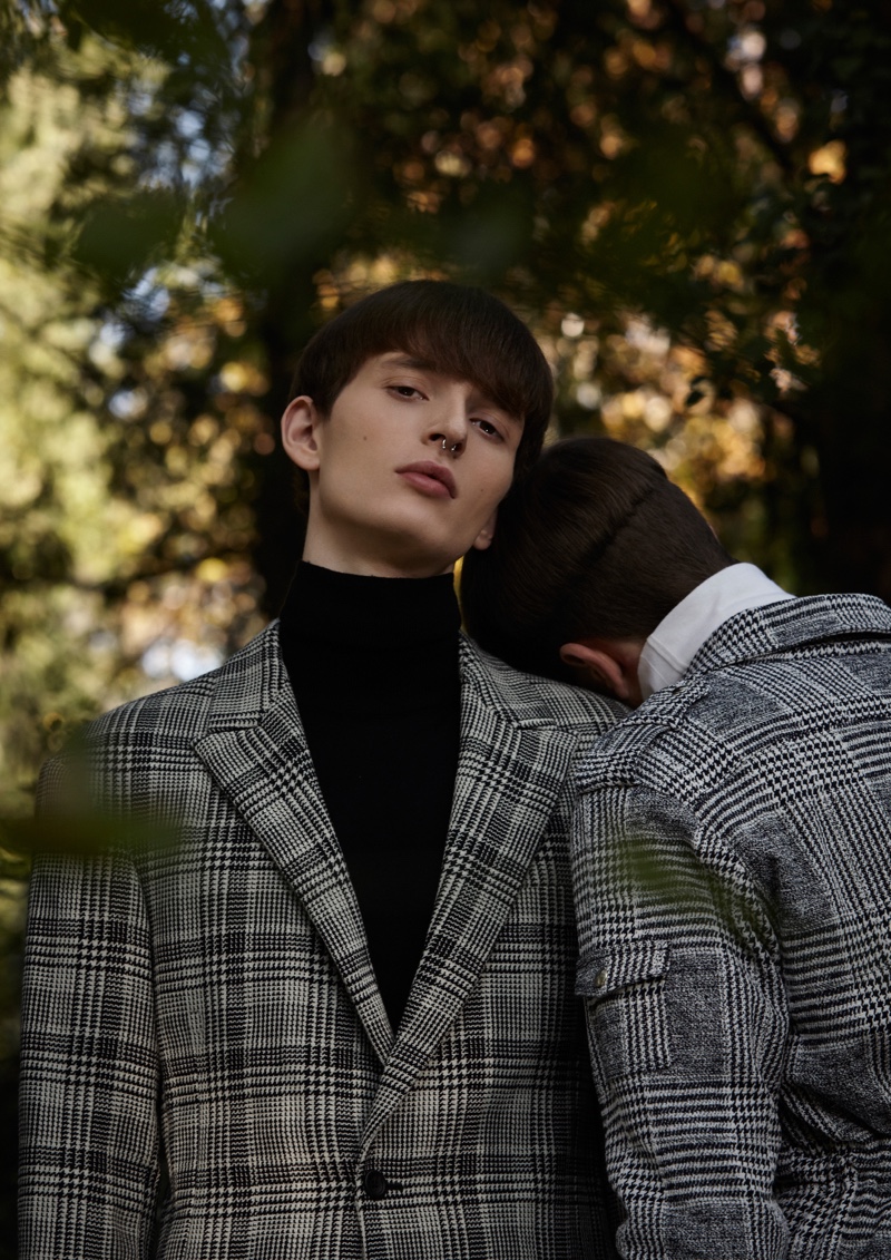 Left to Right: Gabriel Demaj wears check jacket Bikkembergs and vintage turtleneck. Andre Fernandez wears check jacket Christian Pellizzari and turtleneck Ermenegildo Zegna.