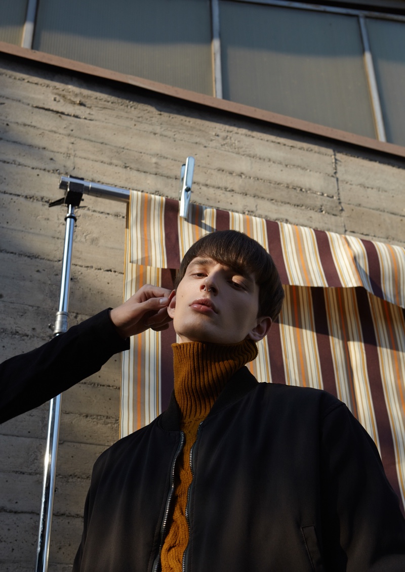 Gabriel Demaj wears a Federico Curradi bomber jacket and Luca Larenza turtleneck.