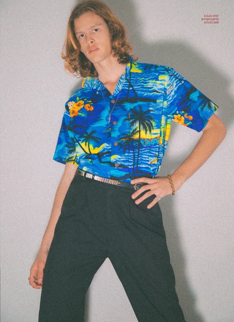 Ariel wears Hawaiian print shirt B.Luxo, pants Armani, and belt Schultz.