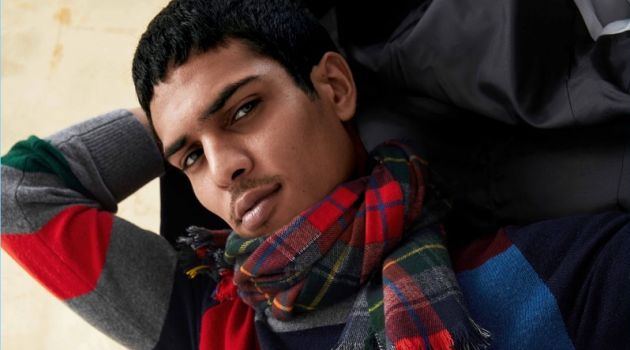 Gap Gets Festive with Stripes & Checks Making a graphic statement, Geron McKinley wears a Gap check sweater and plaid scarf.