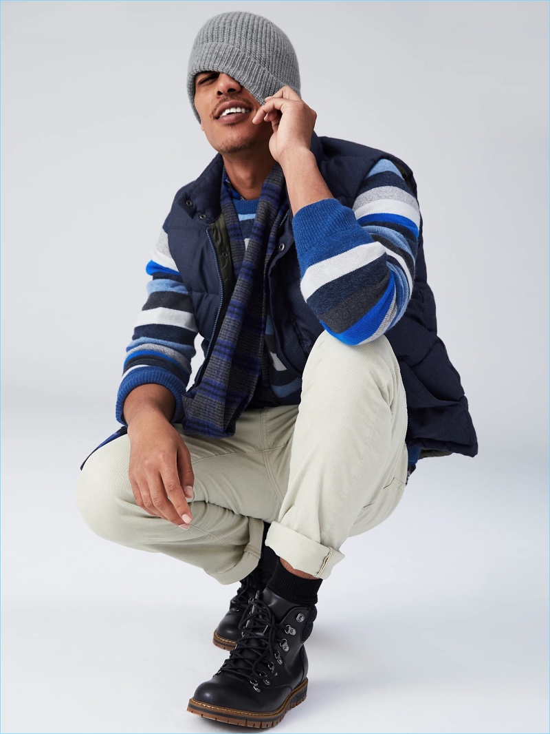 Geron McKinley is a cool vision in a Gap stripe sweater, puffer vest, and corduroy pants.