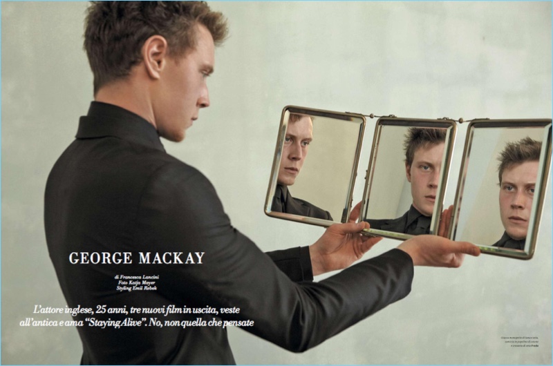 George MacKay dons a tailored look by Prada.