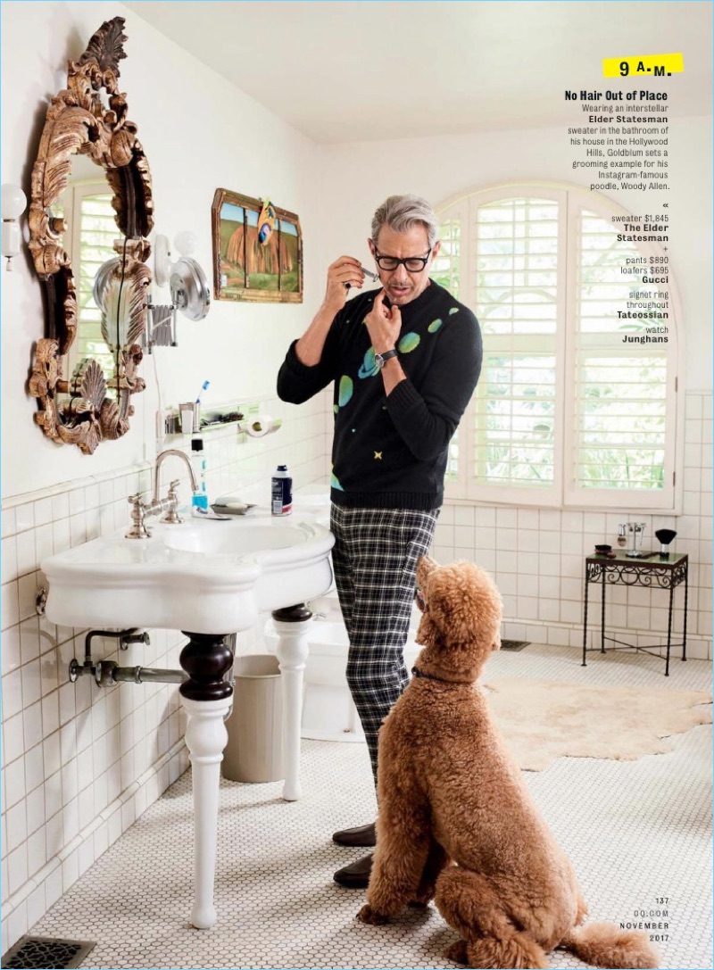 Getting ready for his day, Jeff Goldblum wears a sweater by The Elder Statesman. He also dons Gucci check pants and loafers.
