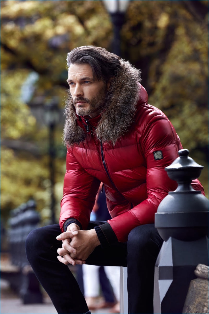 American model Ben Hill wears a red down jacket for Lufian's fall-winter 2017 campaign.
