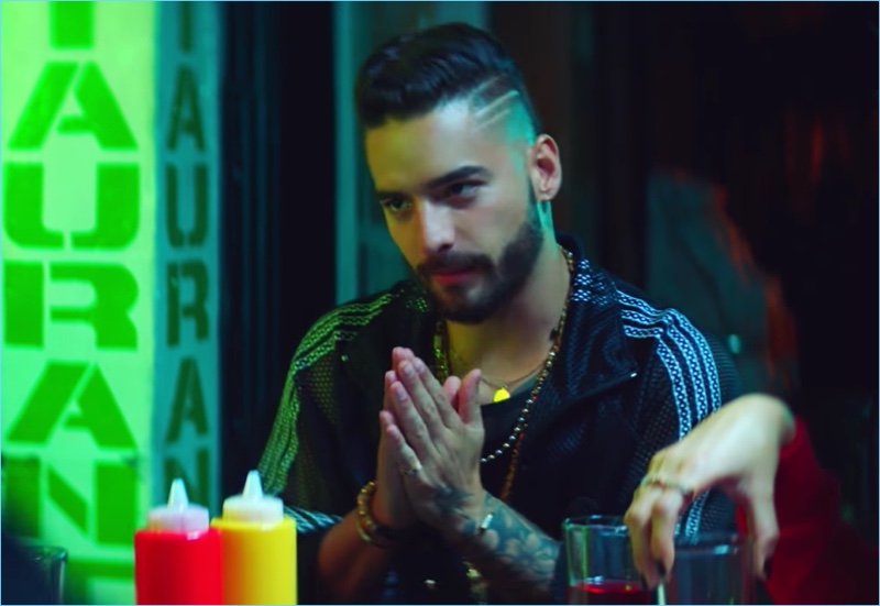 Colombian singer Maluma wears an Adidas by Alexander Wang mesh track jacket.