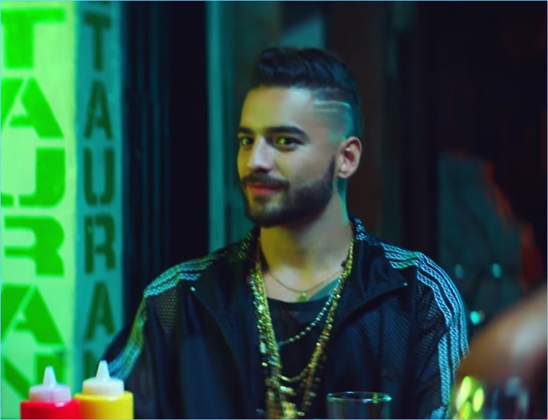 Maluma makes an appearance in the Hola music video for his song with Flo Rida.