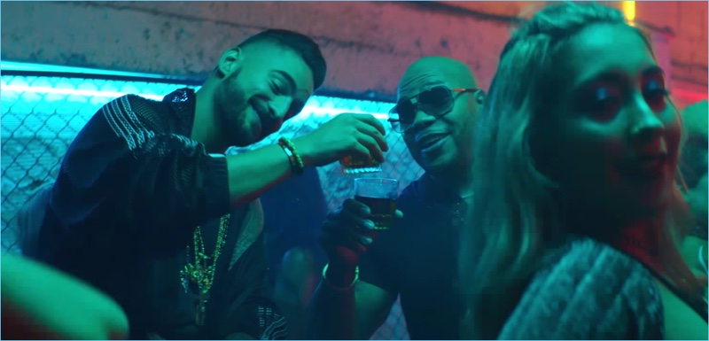 Singer Maluma joins Flo Rida for their Hola music video.