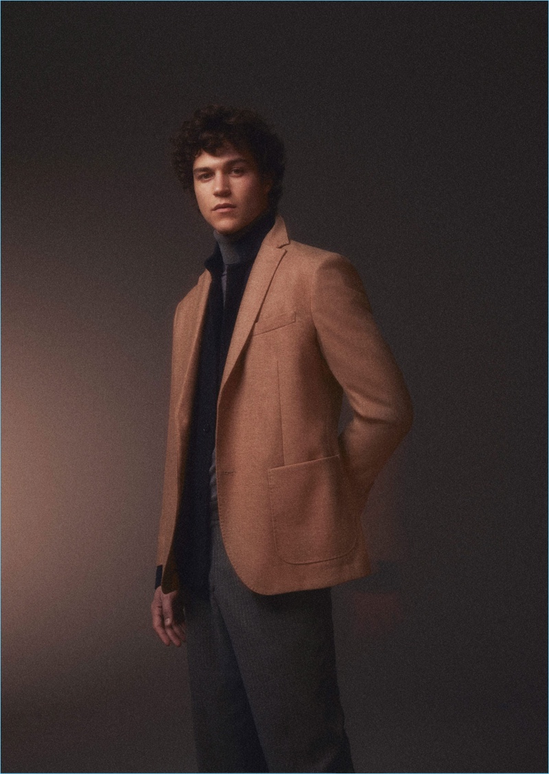 Miles McMillan dons camel and black tones for Massimo Dutti.