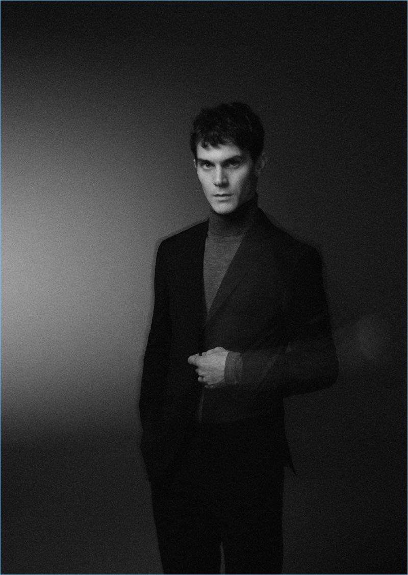 Top model Vincent LaCrocq wears tailoring for Massimo Dutti's holiday gift guide.