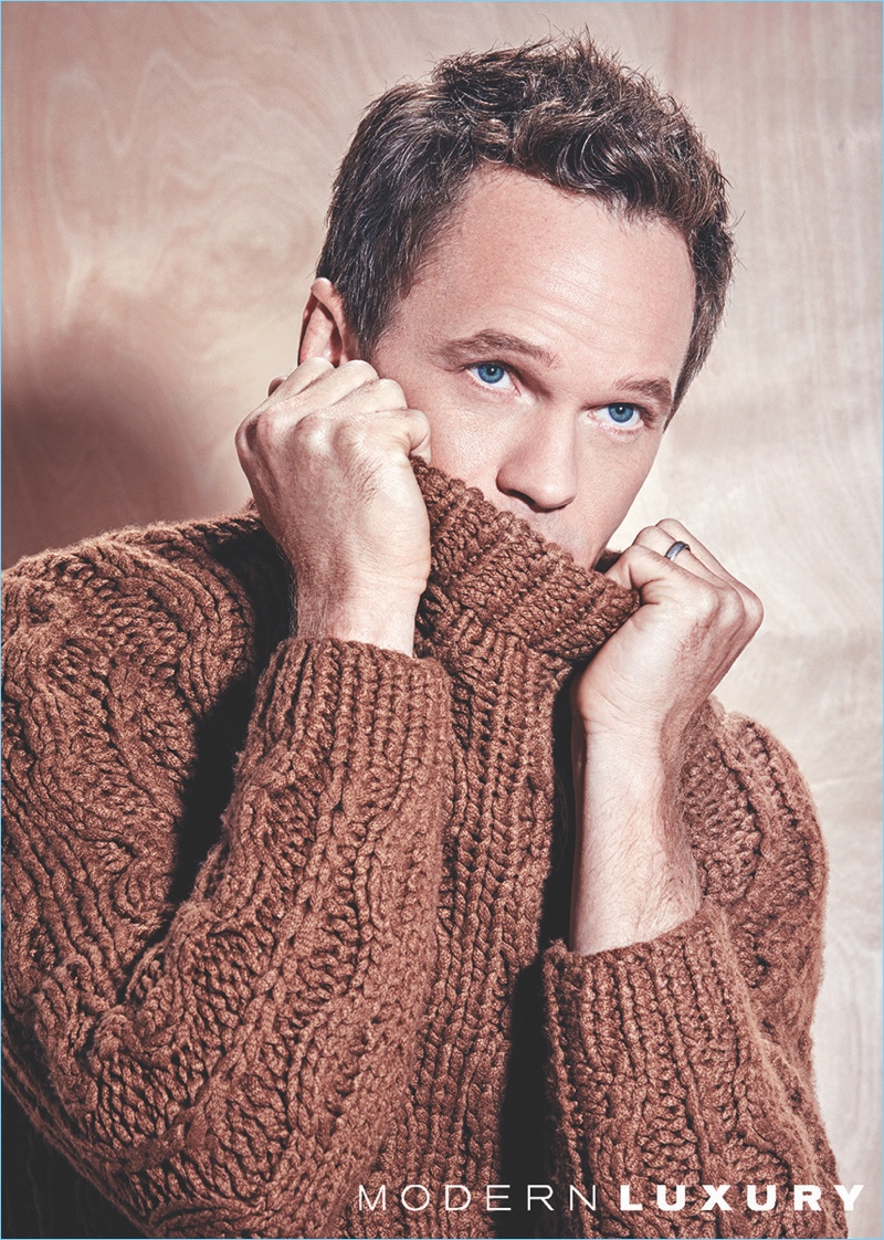 Connecting with Modern Luxury, Neil Patrick Harris wears a Salvatore Ferragamo sweater.