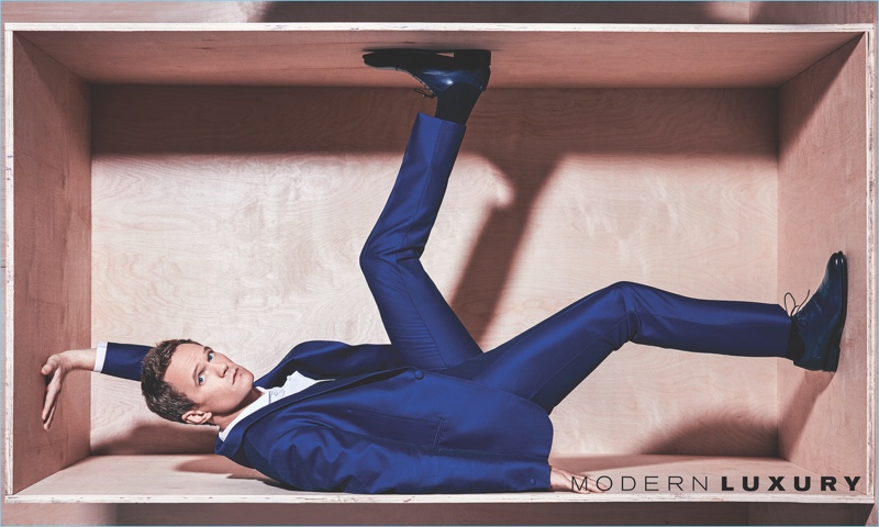 Actor Neil Patrick Harris wears a Berluti suit with a BOSS shirt and Florsheim shoes.