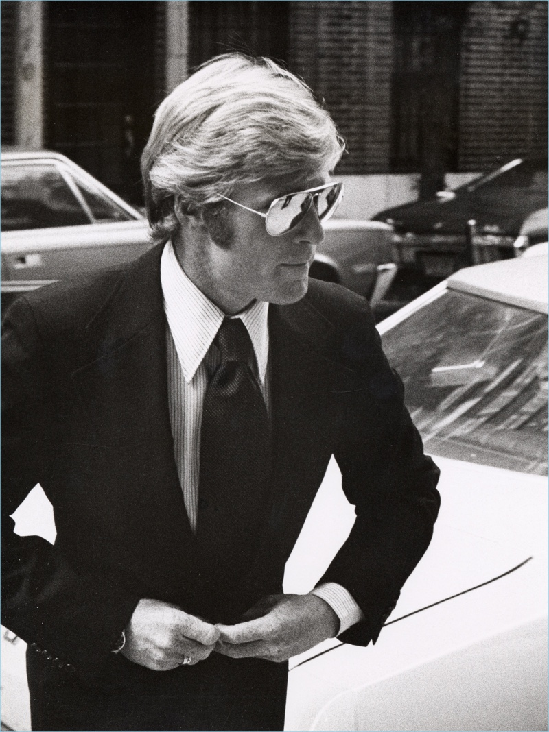 Hollywood icon Robert Redford wears mirrored Ray-Ban aviator sunglasses.