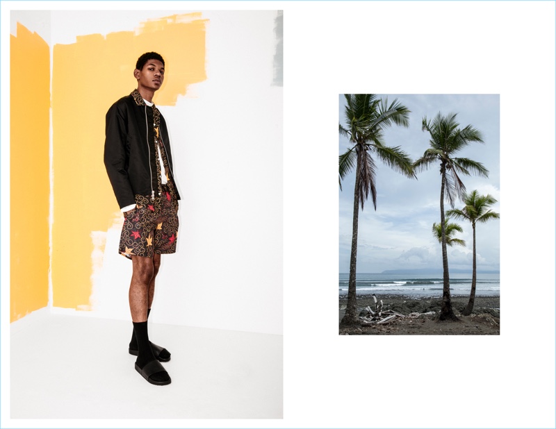 Saturdays NYC collaborates with Mr Porter for a resort collection. The lineup includes statement pieces such as a Batik print camp-collar shirt and shorts. Here, it's worn with a satin bomber jacket and slide sandals from the range.