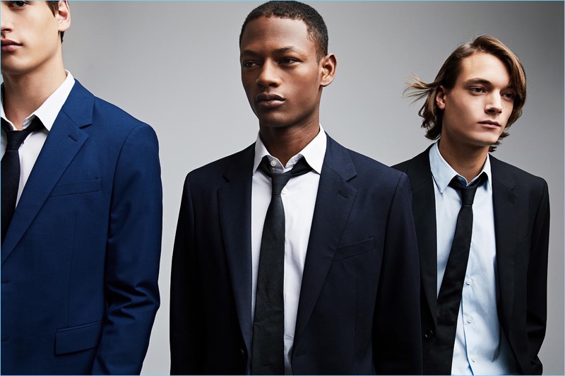 Models Jegor Venned, Lucas Cristino, and Timur Muharemovic come together in Theory suits.