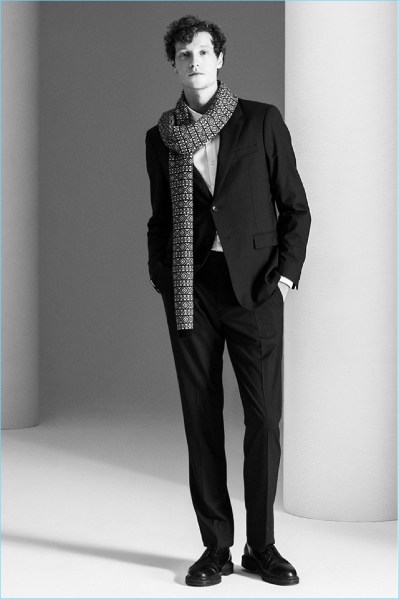 Theory’s Good Wool suit jacket and pants shines with a slim shirt. A cashmere fair isle scarf adds a holiday splash.