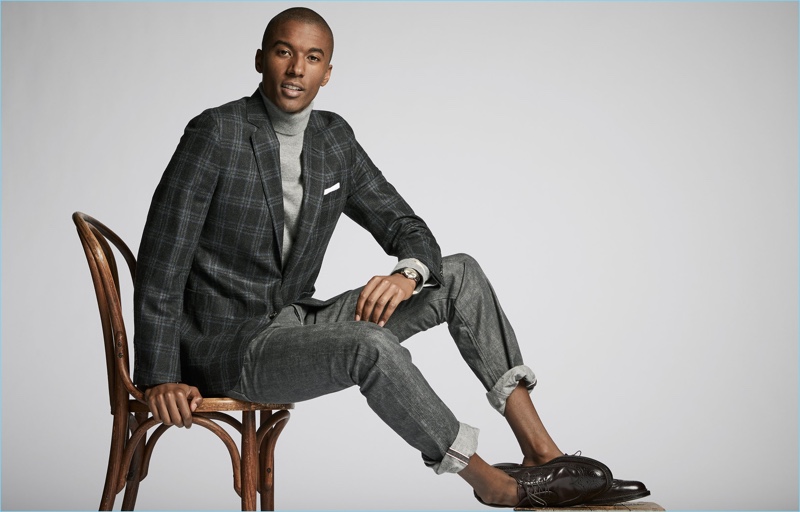 Dressed for dinner, Claudio Monteiro wears a Todd Snyder Black Label check sport coat. The top model also sports a Todd Snyder turtleneck and denim jeans. Alden dress shoes complete Claudio’s look.