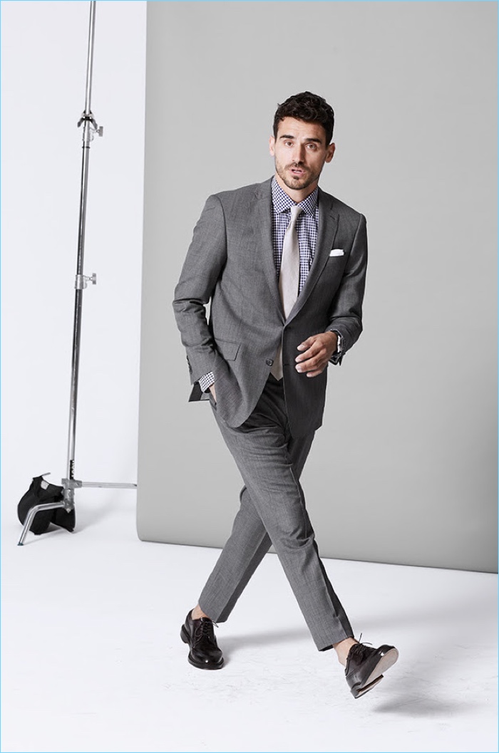 Model Arthur Kulkov wears Todd Snyder's stretch Italian wool Sutton suit in light grey.