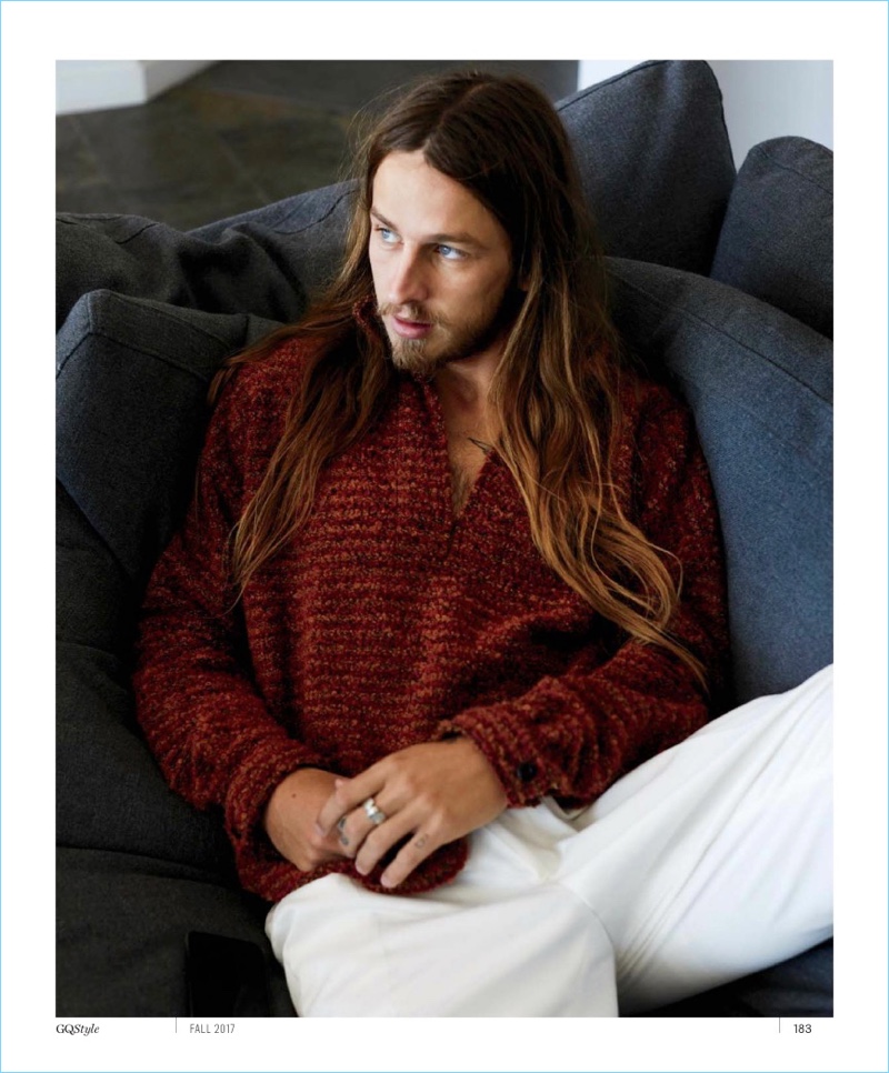 Riley Hawk wears an Eidos sweater with Etro pants.