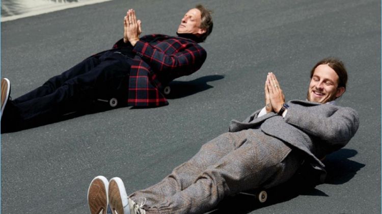 Michael Schmelling photographs Tony and Riley Hawk for GQ Style. Tony wears a coat and turtleneck by HUGO with his own Levi's jeans. Meanwhile, Riley sports an Ermenegildo Zegna Couture suit his own Lakai sneakers.