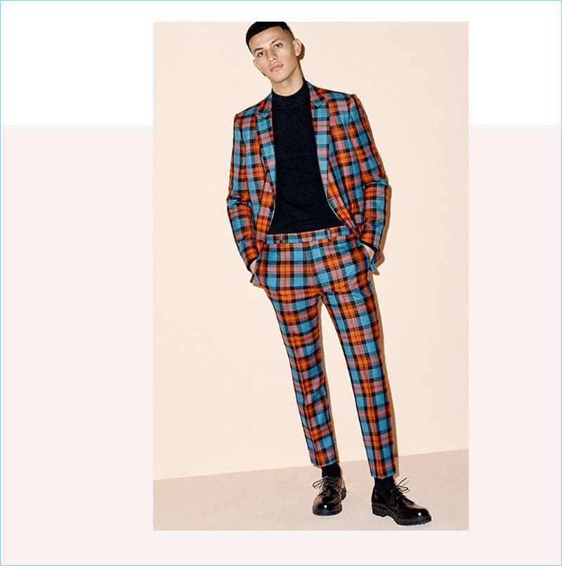 Take a style tip from Topman and wear a bold plaid suit for the holidays.