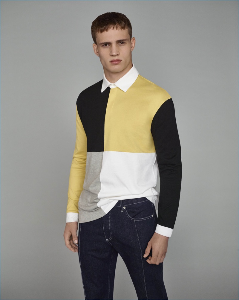 Julian Schneyder sports a color blocked polo for Topman's fall-winter 2017 campaign.