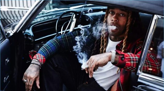 Ty Dolla $ign Talks Music with SSENSE Getting behind the wheel, Ty Dolla $ign wears a Loewe jacket and NUDIE JEANS jeans.