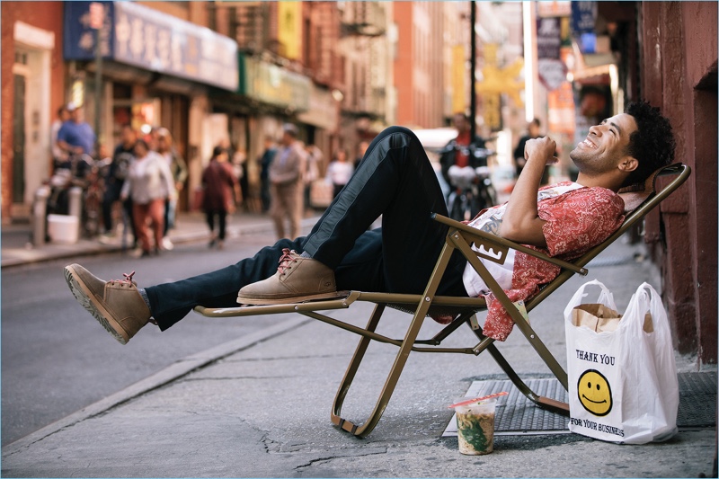 Stopping by Chinatown, KYLE wears UGG Neumel waterproof boots.