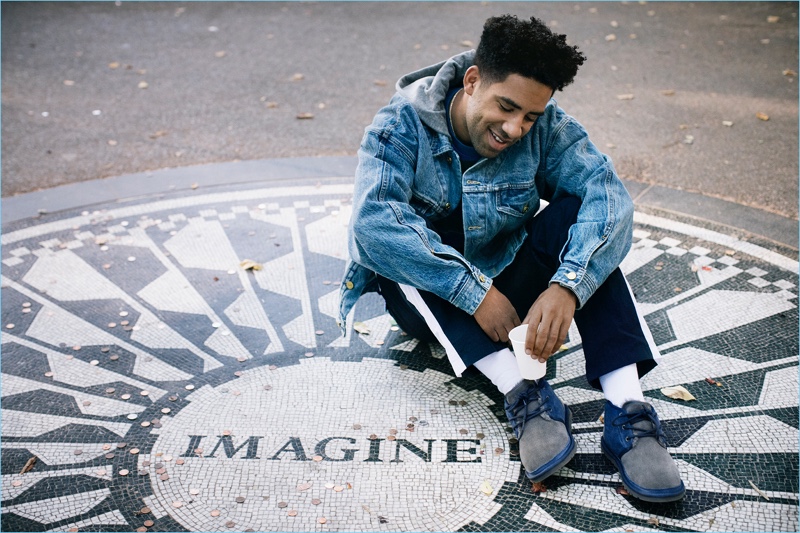 Visiting Central Park, KYLE takes note of the John Lennon "Imagine" landmark. He wears UGG's Neumel color block shoes.