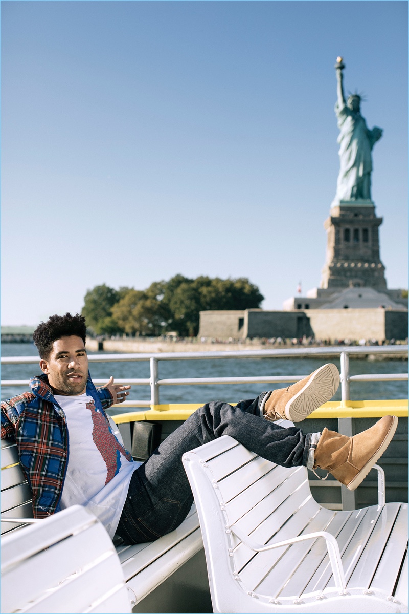 Arriving in New York City, KYLE rocks UGG classic toggle boots.