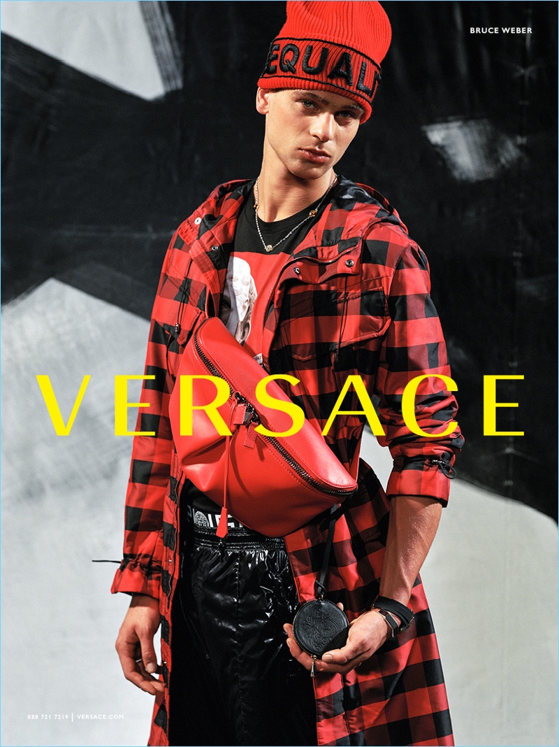 Barry Lomeka rocks a red and black look for Versace's fall-winter 2017 campaign.