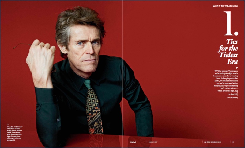 Willem Dafoe wears a Burberry shirt with an Etro tie.