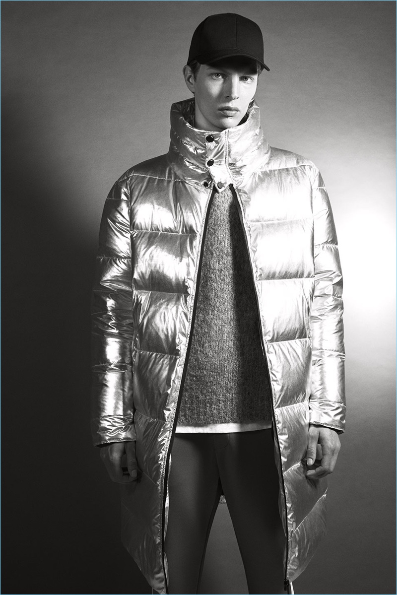 German model Tim Schuhmacher makes a statement in a metallic silver puffer jacket from Zara. » Cold Days: Zara Man Makes a Case for the Puffer Coat German model Tim Schuhmacher makes a statement in a metallic silver puffer jacket from Zara.
