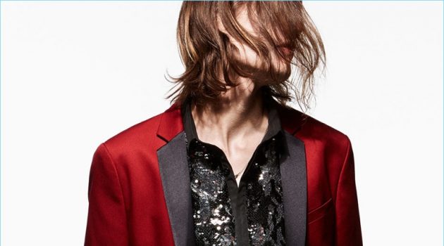 Marcel Castenmiller wears a red tuxedo jacket, embellished shirt, and skinny jeans by Zara Man.