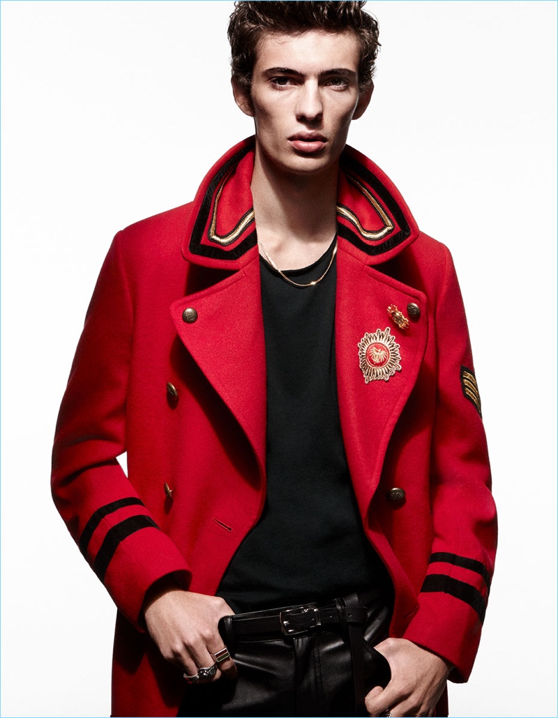 Front and center, Piero Mendez shines in a red officer coat by Zara Man.