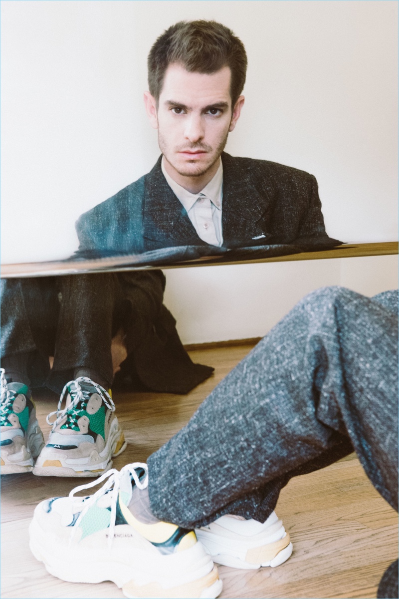 Embracing a tailored look, Andrew Garfield wears Balenciaga.