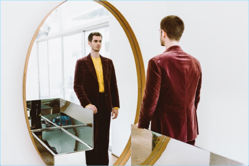 Starring in a Flaunt photo shoot, Andrew Garfield wears a Hermès suit with a Neil Barrett sweater.