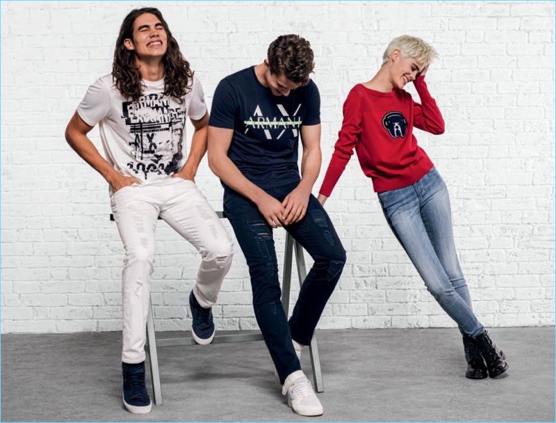 Clad in denim, models Vito Basso, Brian Altemus, and Taja Feistner connect with Armani Exchange.