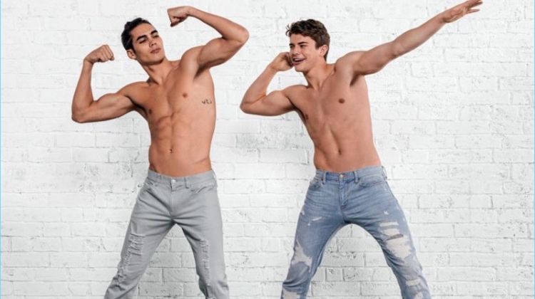 Models Vito Basso and Brian Altemus flex in cheeky shirtless images for Armani Exchange denim.