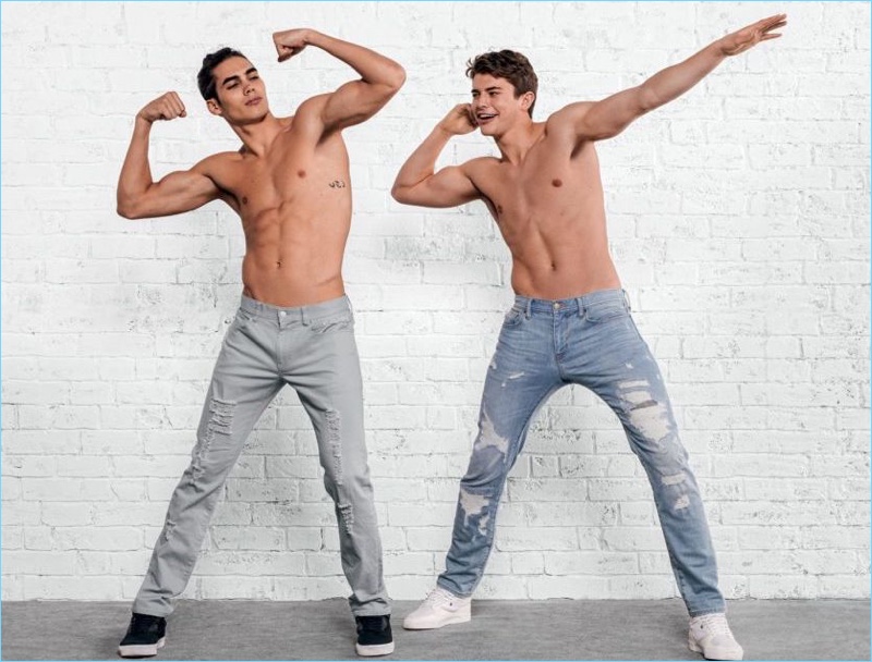 Models Vito Basso and Brian Altemus flex in cheeky shirtless images for Armani Exchange denim.
