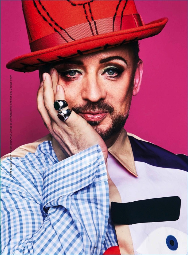 Singer Boy George wears a Walter van Beirendonck shirt with one of his custom hats.