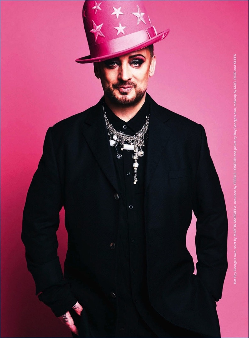 Sporting another one of his own hats, Boy George rocks a Maison Margiela shirt with a Pebble London necklace and his own pieces.